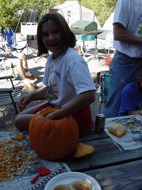 Sara Mills carving pumpkin 1999 Fall campout.JPG